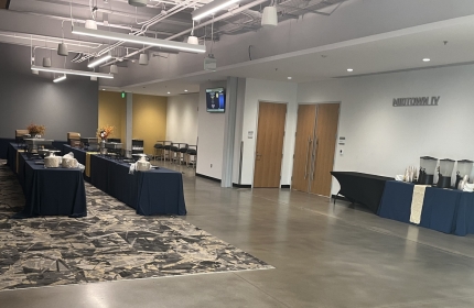 Midtown prefunction space set with two buffet lines